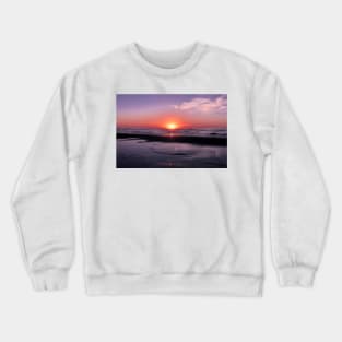 Orange and blue sunset on a beach Crewneck Sweatshirt